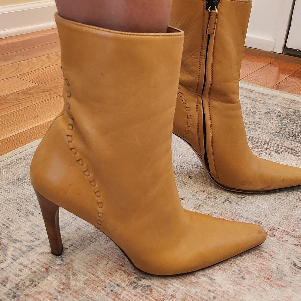 Gucci vintage water damage at toes on zipper sides.  See photos at end of pics